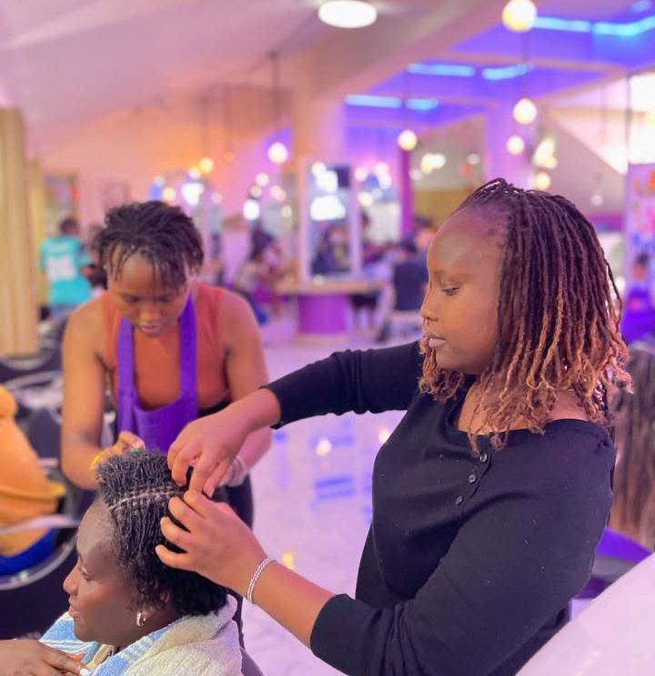 Professional hair installation at Locked by Monique Nairobi Sisterlocks and microtwists