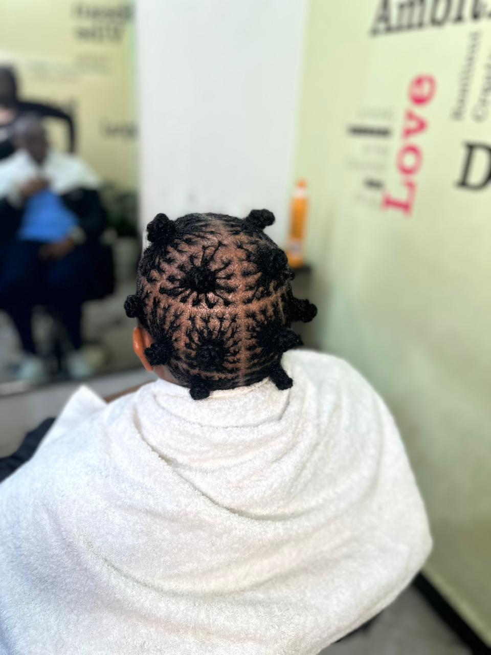 Sisterlocks installation in Nairobi Kenya at Locked by Monique